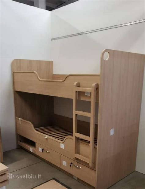 dviejų aukštų vaikiška lova su stalčiais