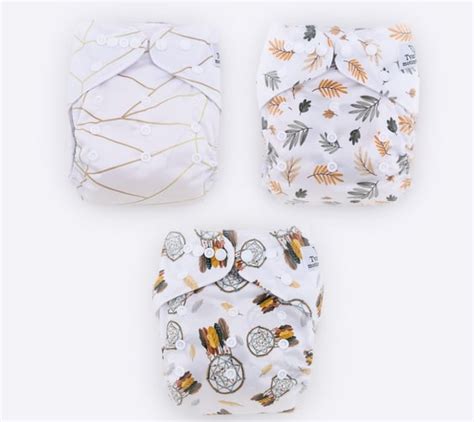 Įvairių daugkartinių sauskelnių tipų ir medžiagų pavyzdžiai