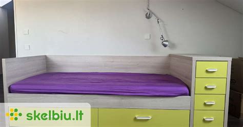 Viengulė daugiaaukštė lova su stalčiais