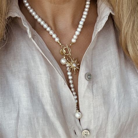 Perlų ir aleksandrito papuošalai