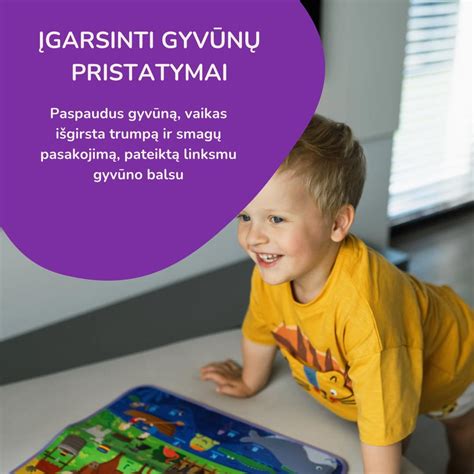 vaikas naudojasi kalbančiomis kortelėmis