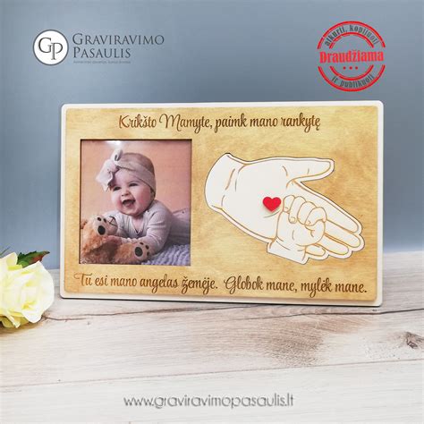 Simbolinis atvaizdas - naujagimio rankytė