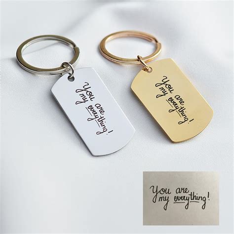 Graviruotas raktų pakabukas su užrašu