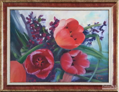 Menininkas tapo aliejiniais dažais ant drobės