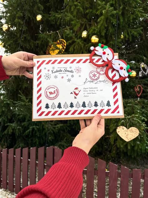 Vaiko rankomis sukurtas Kalėdų Senelio origami