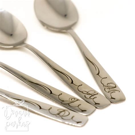 graviruotas sidabrinis šaukštelis