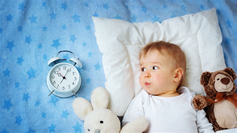 Vaikas laiko smuiko stryką