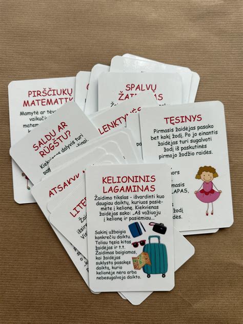 Simbolinis paveikslėlis, vaizduojantis žaidimo korteles su skirtingais simboliais